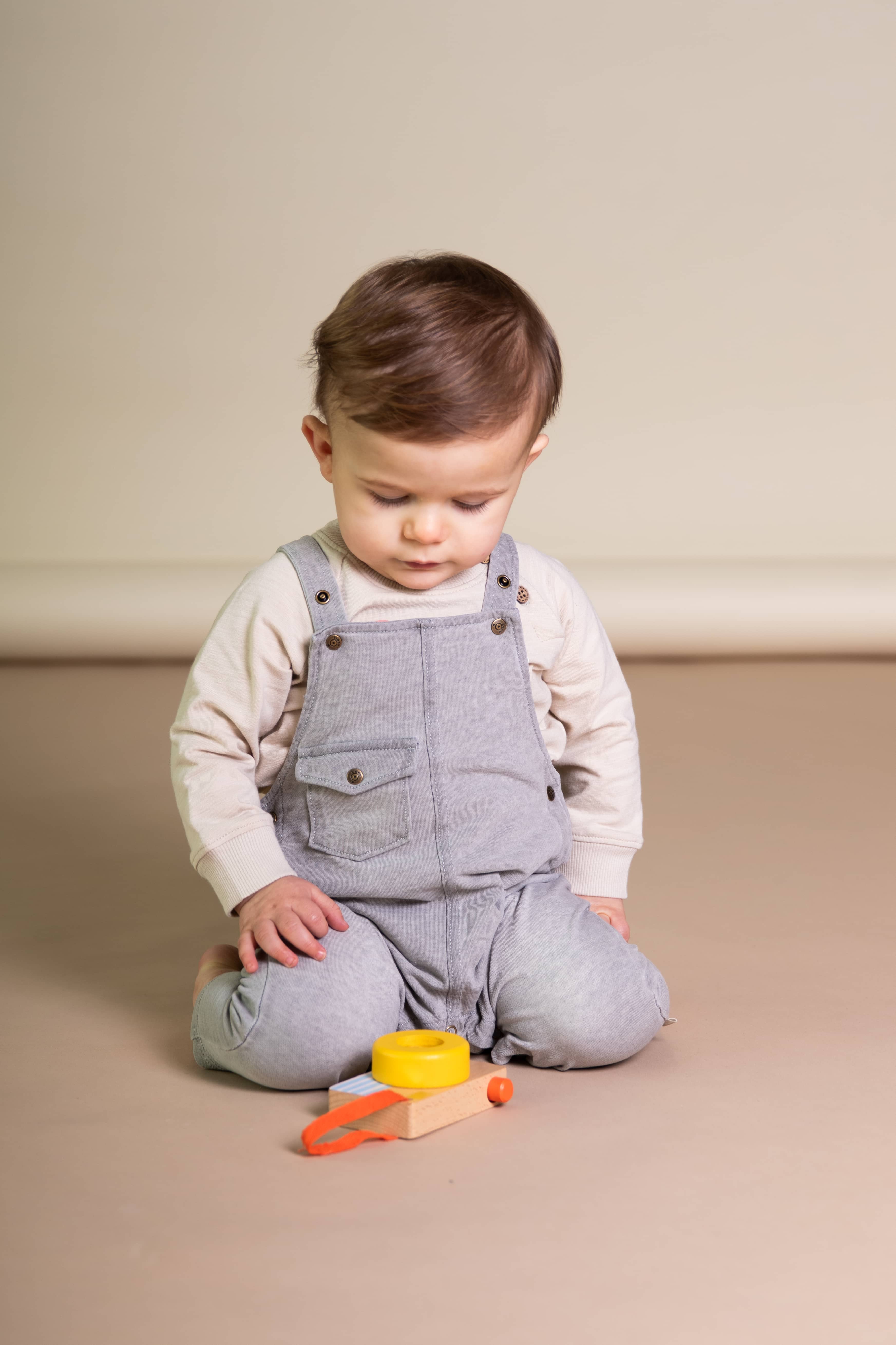 Grijze stonewashed salopette