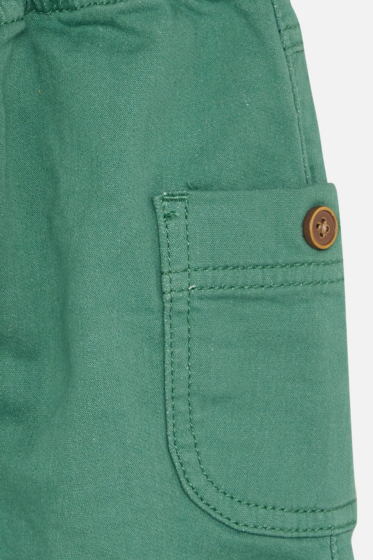 Lichtgroene broek met opgestikte zakken