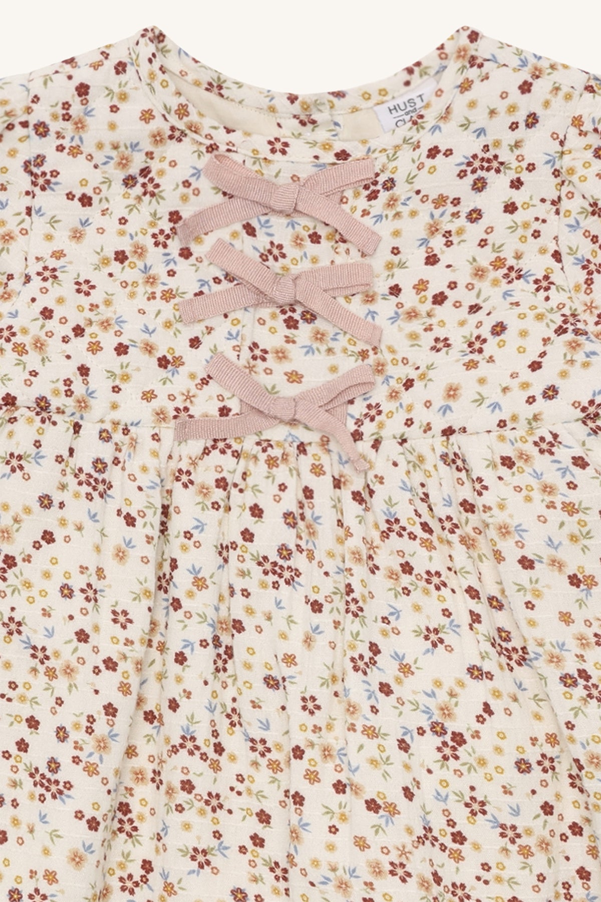 🌼 Hust&Claire – Bloemenjurkje met Strikjesmagie 🌼