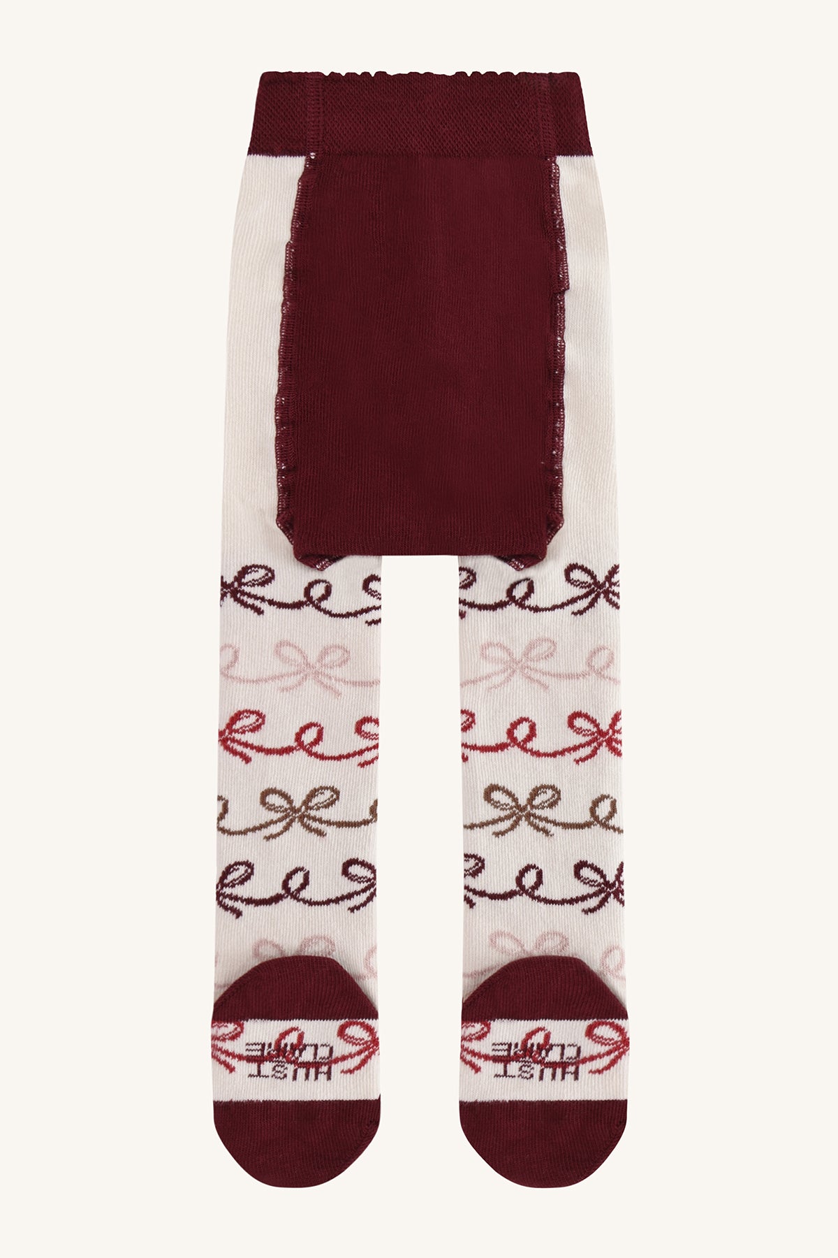 🧦 Hust & Claire – Crèmekleurige kousenbroek met strikjesmotief 🎀