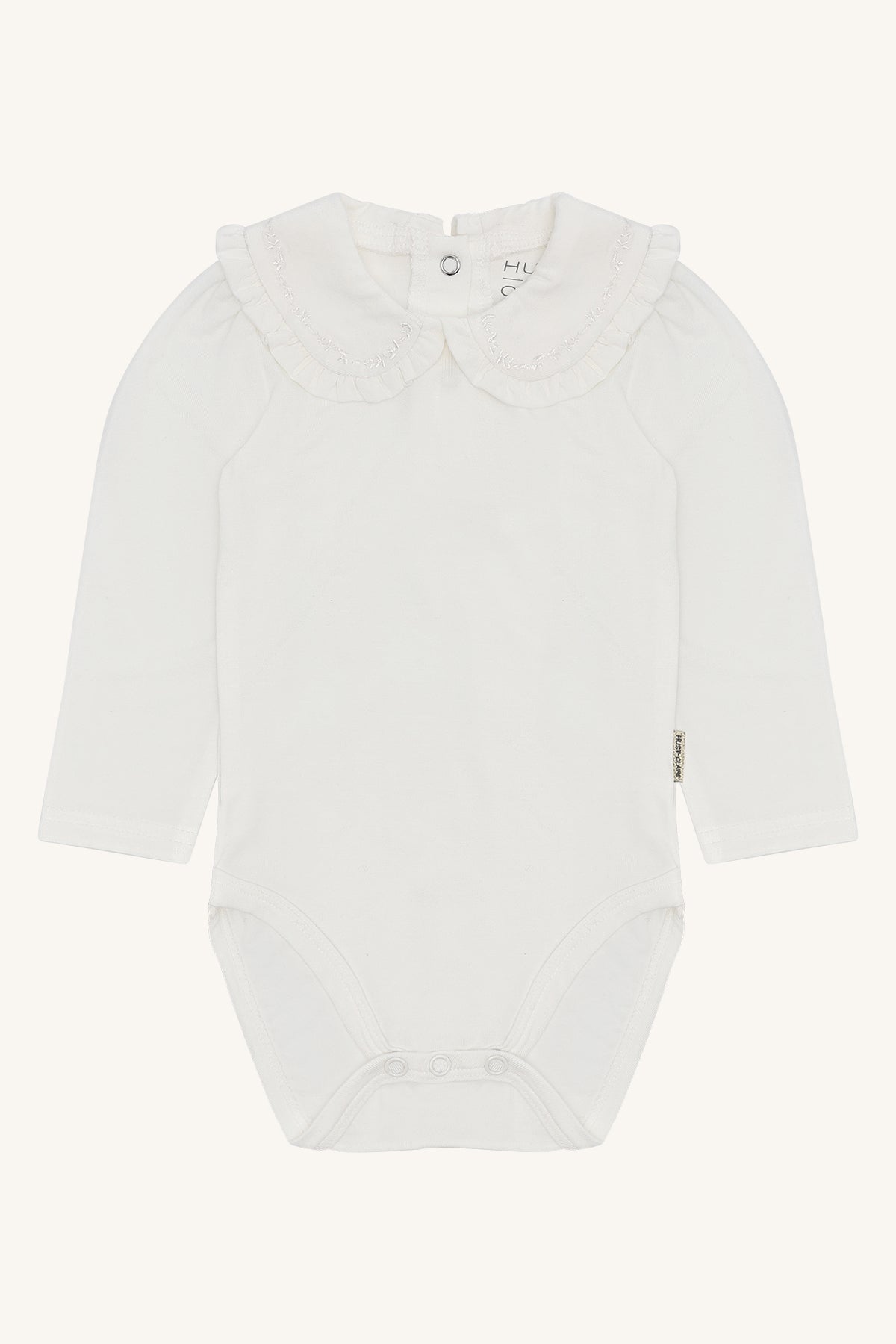 🤍 Hust & Claire – Witte body met kraagje en borduursel ✨
