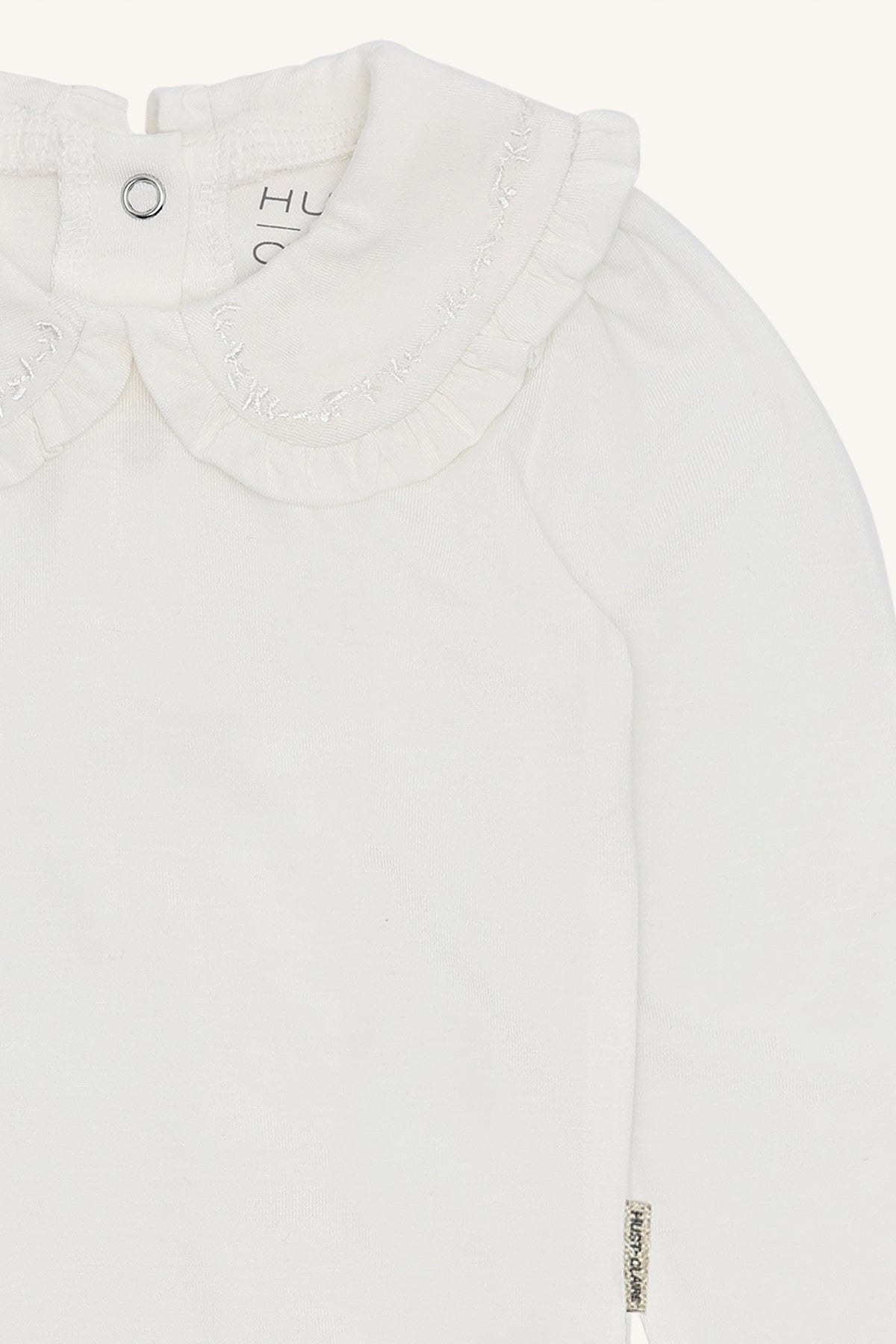 🤍 Hust & Claire – Witte body met kraagje en borduursel ✨