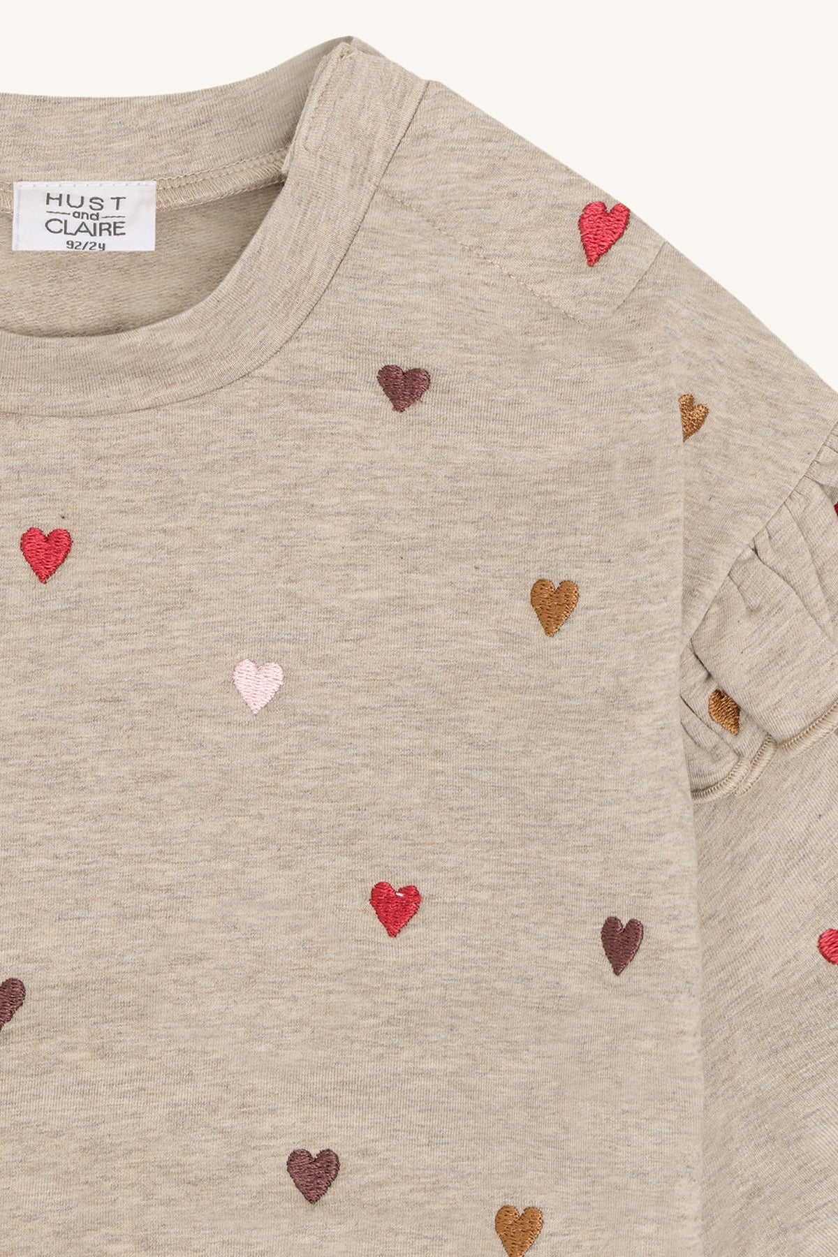 💗 Hust & Claire Heartbeat – Sweater met geborduurde hartjes & ruches