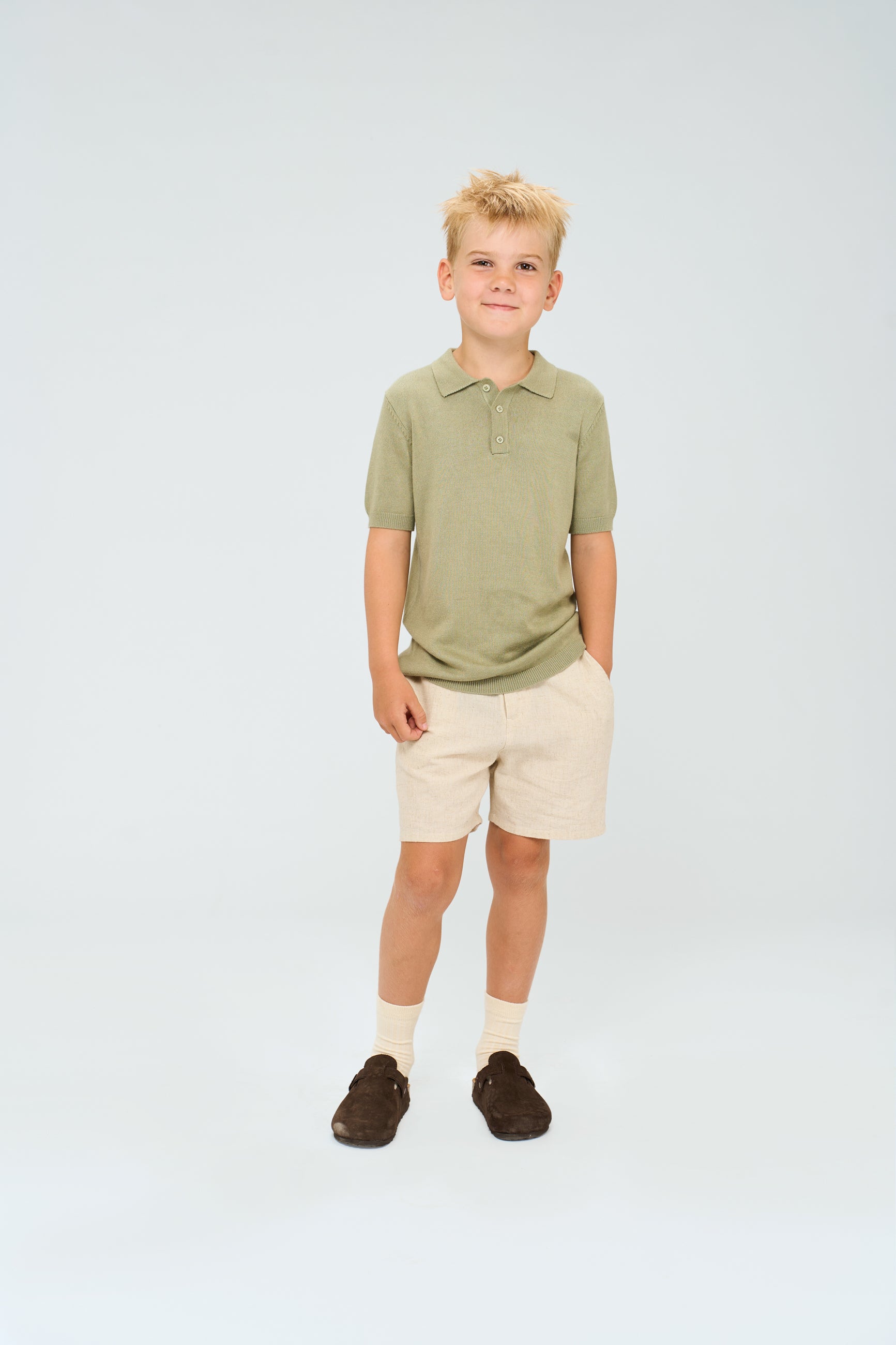 🌿 The New Orlando – gebreide polo in zacht groen