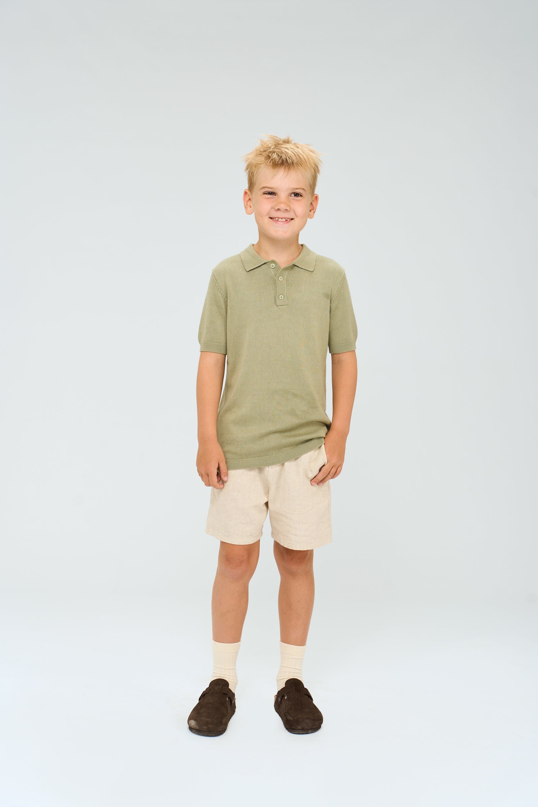 🌿 The New Orlando – gebreide polo in zacht groen